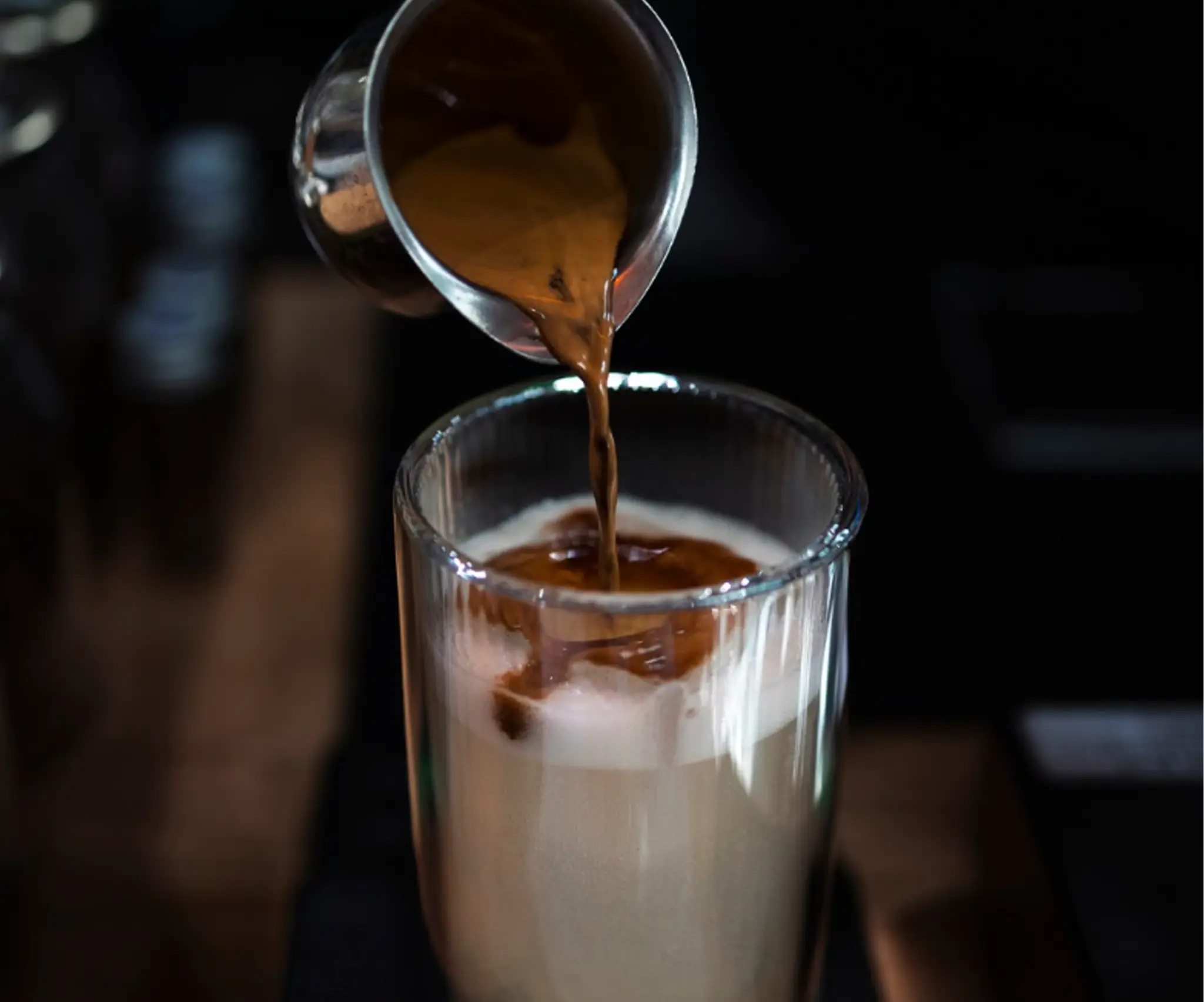 K3 Artisan Coffee - Pouring Coffee