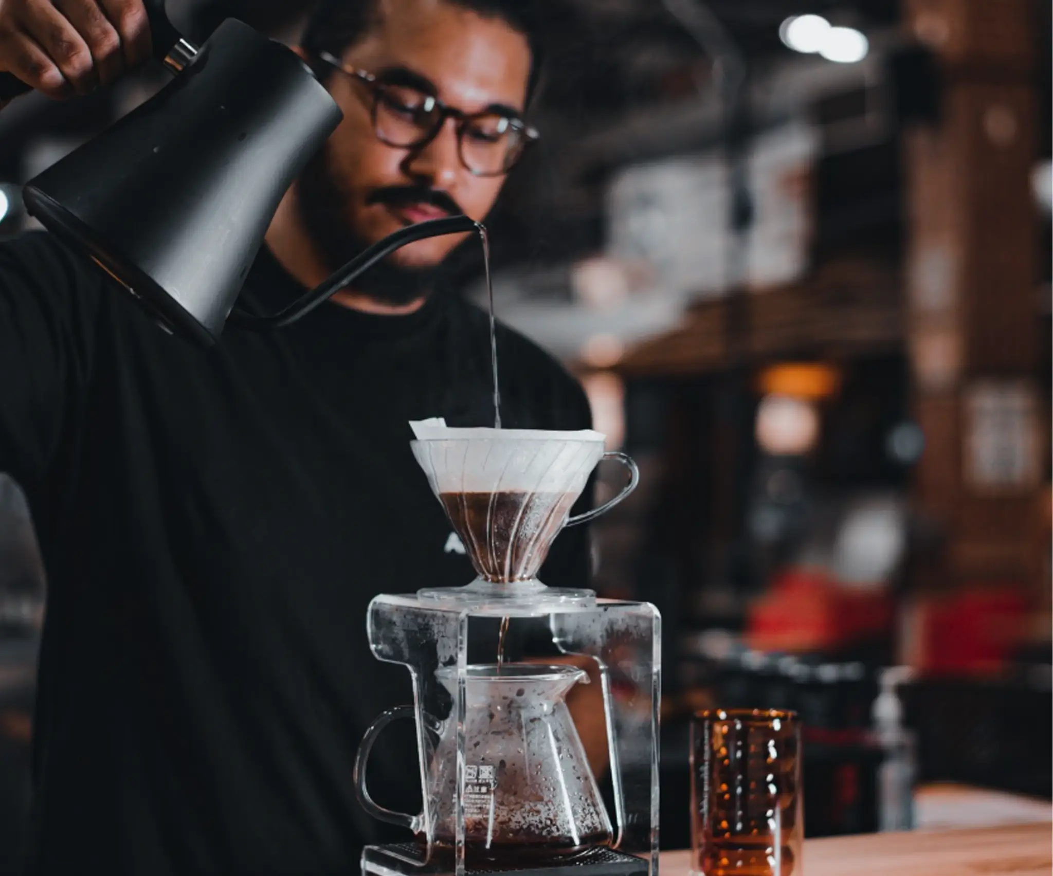 K3 Artisan Coffee - Pouring Coffee